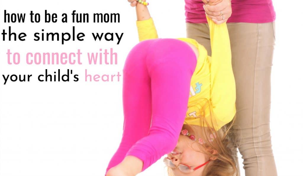 woman in bright colors flipping her daughter while learning how to be a fun mom the simple way