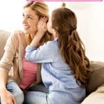 daughter whispering to mom on the couch while mom discovers how parents can influence their children