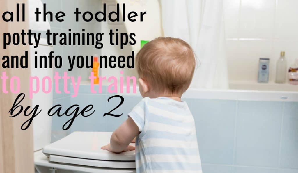 cute little boy standing by toilet getting ready to toddler potty train