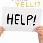 woman holding help sign why moms yell